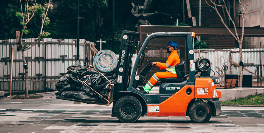 Forklift loading cargo safely as part of the Essential Safety Services Forklift New Operator course.